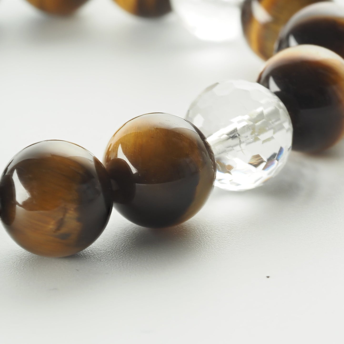 タイガーアイ×カット水晶｜力強さに澄んだきらめきを添えるブレスレット10mm(H0078）
